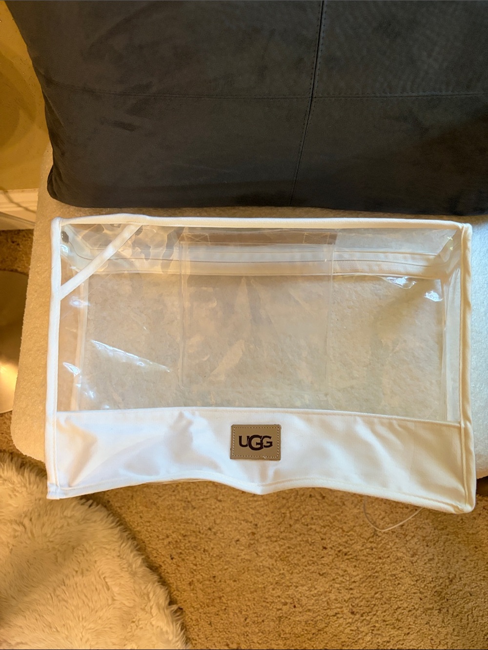 UGG Clear Travel Organizer Sleeve in White with Brown Logo Patch